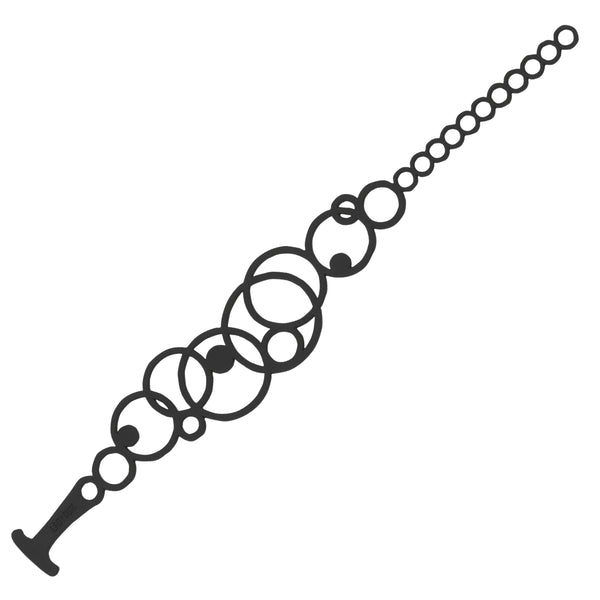 vue en entier, à plat, bracelet disco, couleur noir. Style bulle, rond, cercle, géométrique, graphique. Ladygum, marque française, bijoux fantaisies en silicone. Léger, souple, waterproof, fermoir en T, réglable, ajustable, minimisant les allergies. Cadeau original.