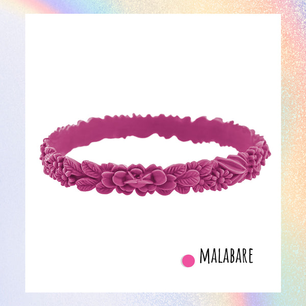 vue zoom, gros plan, en entier, bracelet boho les fleurettes, couleur malabare, rose fuchsia, rose tonique. Bijoux fantaisies en silicone, marque française, ladygum. Bracelet aux fleurs en relief, non ajustable, taille unique, facile à enfiler au poignet. Cadeau original