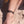 vue taille réelle, porté par mannequin, dorine gaudin, chaîne de cheville, modèle étoiles, couleur noir. Ladygum, bijoux fantaisies en silicone, créateurs, designers. Style multi rangs, princesses, cosmique, planète, étoiles. Cadeau original. Légère, souple, ajustable, longueur réglable, fermoir en T.