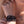 zoom, vue gros plan, bracelet charleston, couleur noir. Vue taille réelle, porté sur poignet par mannequin Dorine Gaudin. Bijoux fantaisies en silicone, ladygum, marque française, créateurs, designers. Style manchette femme, montre, art déco, vintage, rétro, graphique, géométrique. Léger, souple, longueur réglable, bracelet ajustable, fermoir en T, résistant à l'eau, à la chaleur, à la lumière, minimisant les allergies. Cadeau original.