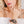zoom, vue gros plan, bracelet courbe, couleur noir. Vue taille réelle, porté sur poignet par mannequin Dorine Gaudin. Bijoux fantaisies en silicone, ladygum, marque française, créateurs, designers. Style nature, manchette femme, fleur, rond, cercle, tourbillon, abstrait, contemporain. Léger, souple, longueur réglable, bracelet ajustable, fermoir en T, résistant à l'eau, à la chaleur, à la lumière, minimisant les allergies. Cadeau original.