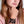 vue gros plan, taille réelle, porté par mannequin sur poignet, youna, bracelet hippie, couleur noir. Silicone, bijoux fantaisies, ladygum, marque française, créateurs, designers. Style manchette, fleur, nature, été, champêtre, plage, marguerite, paquerette, bohème, année 70. Souple, léger, résistant à l'eau, à la chaleur, à la lumière. Longueur réglable, bracelet ajustable. Fermoir en T, plusieurs trou pour régler à la bonne taille.