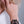 vue gros plan, détails, bracelet mantra, noir, silicone, porté sur mannequin, dorine gaudin. Ladygum, bijoux fantaisies, créateurs, designers, marque française. Style manchette, zen, fleur, floral, indien, nature, feuilles, lotus. Souple, léger, minimisant les allergies, longueur réglable, fermoir en T, résistant à l'eau, à la chaleur, à la lumière.