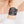 zoom, vue gros plan, bracelet maori, couleur noir. Vue taille réelle, porté sur poignet par mannequin Dorine Gaudin. Bijoux fantaisies en silicone, ladygum, marque française, créateurs, designers. Style nature, manchette femme, jungle, feuille, ajouré, tribal, ethnique, tatoo. Léger, souple, longueur réglable, bracelet ajustable, fermoir en T, résistant à l'eau, à la chaleur, à la lumière, minimisant les allergies. Cadeau original.