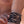 zoom, vue gros plan, bracelet safari, couleur noir. Vue taille réelle, porté sur poignet par mannequin Dorine Gaudin. Bijoux fantaisies en silicone, ladygum, marque française, créateurs, designers. Style manchette femme, ajouré, tribal, tatoo, ethnique, courbes, abstrait. Léger, souple, longueur réglable, bracelet ajustable, fermoir en T, résistant à l'eau, à la chaleur, à la lumière, minimisant les allergies. Cadeau original.