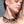 zoom, vue gros plan, collier corail, couleur noir, dispo en rouge/corail. Vue taille réelle, porté par mannequin dorine gaudin. Bijoux fantaisies en silicone, ladygum, marque française, créateurs, designers. Style plastron, algues, mer, plante, feuille, nature. Léger, souple, résistant à l'eau/à la chaleur/à la lumière. Collier ajustable, longueur réglable, fermoir en T. Cadeau original.