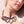 zoom, vue gros plan, collier diamant, couleur noir. Taille réelle. Bijoux fantaisies en silicone, ladygum, marque française, créateurs, designers. Style plastron, large, grand, graphique, géométrique, contemporain, triangle. Léger, souple, longueur réglable, ajustable, minimisant les allergies, résistant à l'eau, à la chaleur, fermoir en T. Cadeau original.