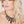zoom, vue gros plan, collier émeraude, couleur noir. Vue taille réelle, porté par mannequin dorine gaudin. Bijoux fantaisies en silicone, ladygum, marque française, créateurs, designers. Style long, pendant, plongeant, plastron, losange, géométrique, minimaliste, simple, effet pierre/cristaux. Léger, souple, résistant à l'eau/à la chaleur/à la lumière. Collier ajustable, longueur réglable, fermoir en T. Cadeau original.