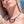 zoom, vue gros plan, collier nymphéa, couleur noir. Vue taille réelle, porté par mannequin dorine gaudin. Bijoux fantaisies en silicone, ladygum, marque française, créateurs, designers. Style fleur, nature, floral, pampilles, zen, yogo, lotus, nénuphar, pétales. Léger, souple, résistant à l'eau/à la chaleur/à la lumière. Collier ajustable, longueur réglable, fermoir en T. Cadeau original.