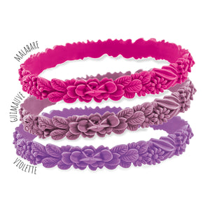 vue gros plan, trio de mix, pack 3 bracelets les fleurettes, bracelets fantaisies aux fleurs 3D. Silicone, bijoux fantaisies, ladygum, marque française, créateurs, designers. 3 couleurs, malabare, guimauve, violette. Souple, léger, bracelet facile à enfiler, non ajustable, bracelet fantaisie, résistant à l'eau, à la chaleur, à la lumière, minimisant les allergies, taille unique.