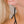 zoom, vue gros plan, paire de boucles d'oreilles primavera, couleur noir. Portées par mannequin Dorine Gaudin. Bijoux fantaisies en silicone, marque française, créateurs, designers. Style longue, pendante, fleur, nature. Attache dormeuse en acier inoxydable. Minimisant les allergies, résistant à l'eau/à la chaleur/à la lumière, souple, léger. Cadeau original.