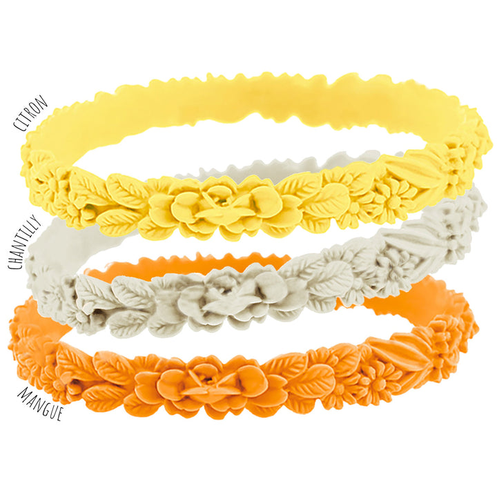 vue gros plan, trio de mix, mix lemonade juice, pack 3 bracelets les fleurettes, bracelets fantaisies aux fleurs 3D en relief. Silicone, 3 couleurs, citron, chantilly, mangue. Ladygum, marque française, bijoux fantaisies, créateurs, designers. Souple, léger, bracelet facile à enfiler, taille unique, non ajustable, résistant à l'eau, à la chaleur, à la lumière, minimisant les allergies.